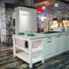 Bauformat Inselküche Landhaus Arbeitsplatte marmor dekor