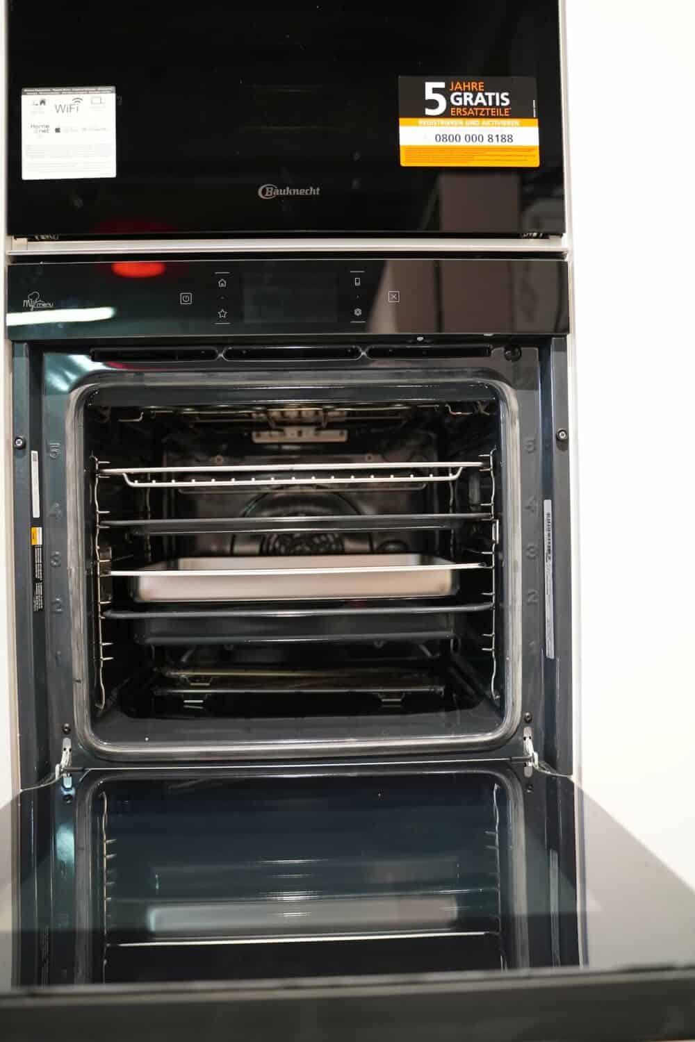 Design L-Küche Weiß Hochglanz Front mit Bauknecht Elekro-geräte